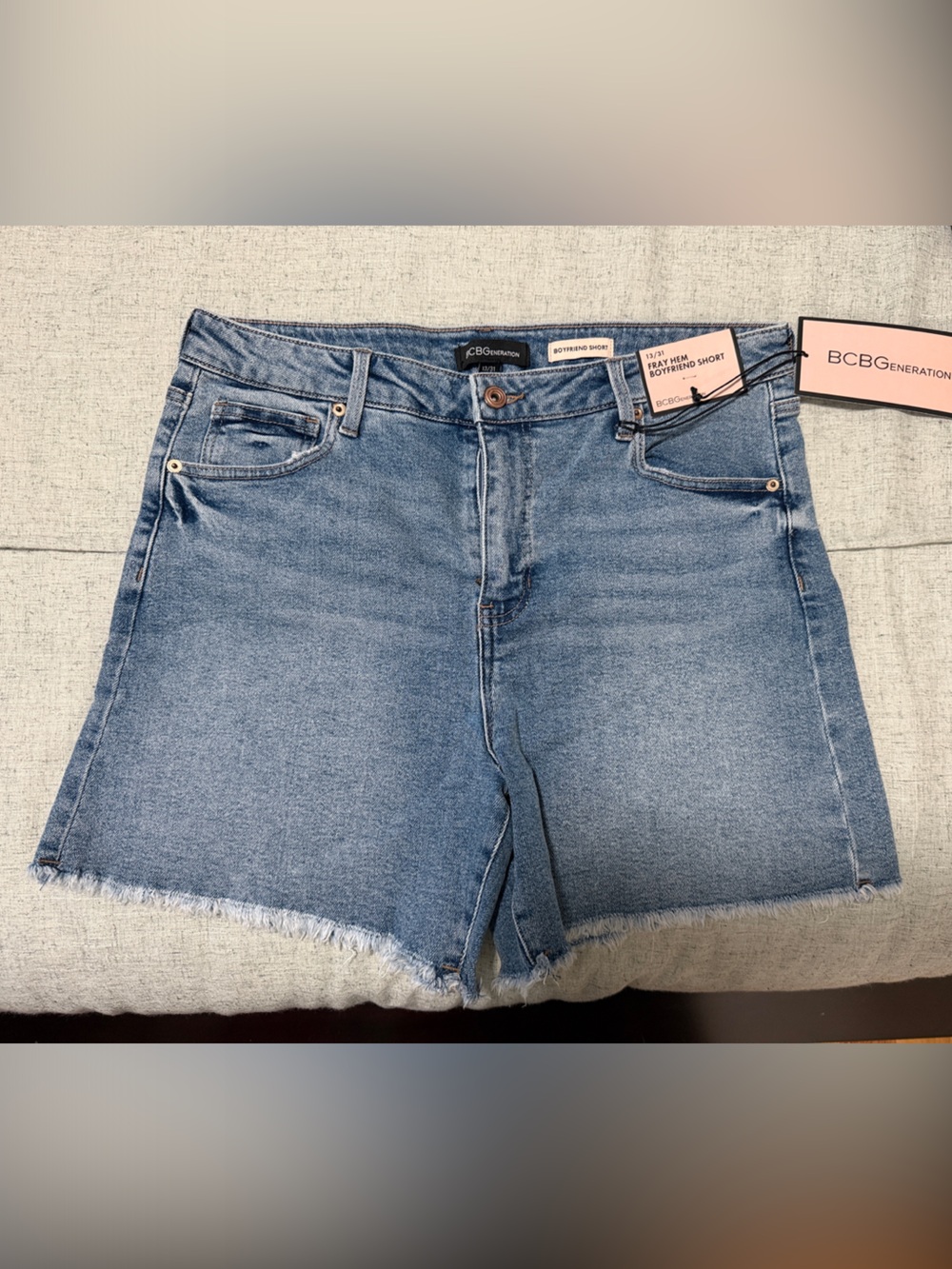 BCBGeneration Medium Blue Frayed Hem Denim Shorts